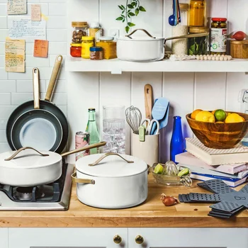 Красив комплект керамични съдове за готвене с незалепващо покритие от 12 теми, бяла глазура, от Дрю Баримор Кухненски принадлежности